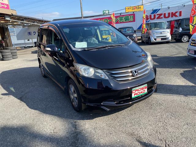 フリード Ｇｉ　エアロ　リヤドア左右パワースライドドアです　スマートキー　３列シート　７人乗り　純正フルエアロ　純アルミ　ワンセグＴＶ　バックモニター付　Ｔミングチェーン車（3枚目）