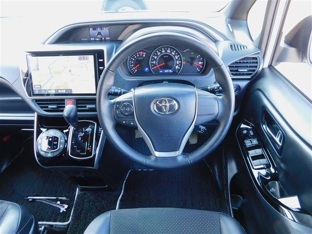 ヴォクシー ZS 煌III プリクラッシュ スマートキ アイスト DVD再生機能 記録簿付き 横滑り防止装置 ナビTV アルミ 三列シート WAC 盗難防止 オートエアコン キーレス ETC装備 パワステ メモリナビ クルコン(4枚目)