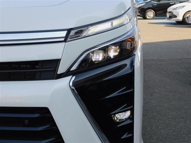 ヴォクシー ZS 煌III プリクラッシュ スマートキ アイスト DVD再生機能 記録簿付き 横滑り防止装置 ナビTV アルミ 三列シート WAC 盗難防止 オートエアコン キーレス ETC装備 パワステ メモリナビ クルコン(33枚目)