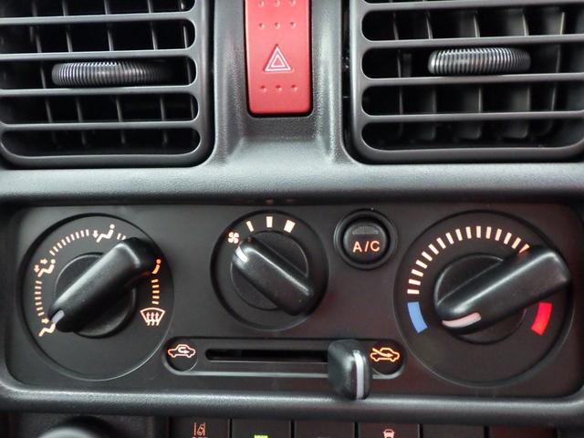 キャリイトラック ＫＸ　高低速２段切替式パートタイム４ＷＤ　デフロック機構電動格納ミラー　ＬＥＤヘッドライト　フォグランプ　パワーウインド　キーレス　純正ＣＤ　２スピーカー　リアゲートチェーン　作業灯　ＬＥＤ室内灯（37枚目）