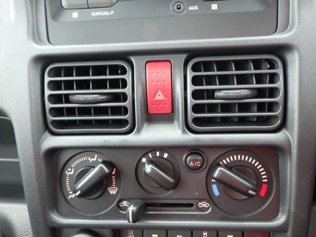 キャリイトラック ＫＸ　高低速２段切替式パートタイム４ＷＤ　デフロック機構電動格納ミラー　ＬＥＤヘッドライト　フォグランプ　パワーウインド　キーレス　純正ＣＤ　２スピーカー　リアゲートチェーン　作業灯　ＬＥＤ室内灯（39枚目）