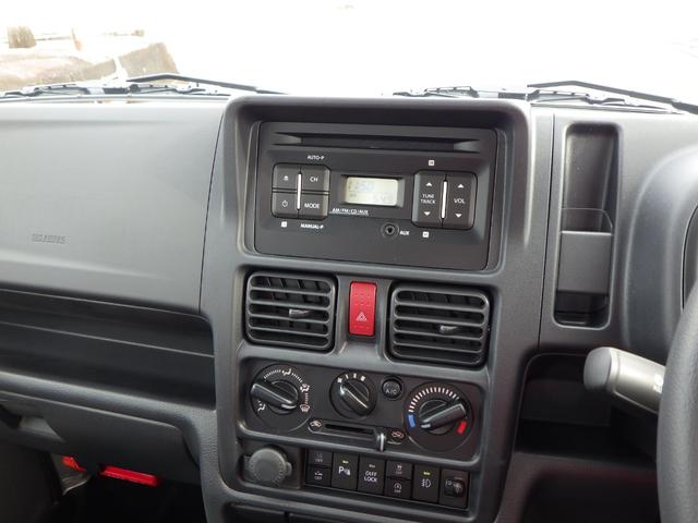 キャリイトラック ＫＸ　高低速２段切替式パートタイム４ＷＤ　デフロック機構電動格納ミラー　ＬＥＤヘッドライト　フォグランプ　パワーウインド　キーレス　純正ＣＤ　２スピーカー　リアゲートチェーン　作業灯　ＬＥＤ室内灯（36枚目）