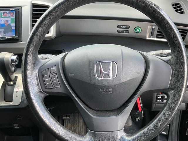 フリード G ジャストセレクション スマートキー SDナビ フルセグ DVD再生 Bluetooth SDカード 後席モニターBカメラ ETC HIDライト 社外14AW オートA/C 両面自動ドア ドアミラーウインカー 6人乗(8枚目)