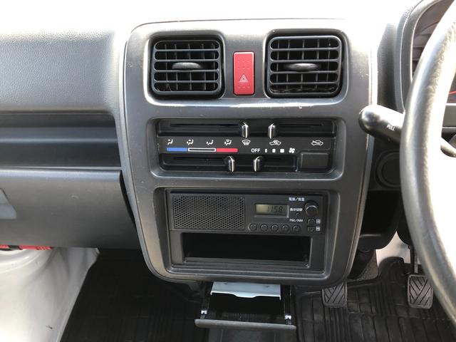 キャリイトラック KCパワステ 4WD 5速ミッション ワンオーナー/禁煙車 タイミングチェーン 三方開 純正AM/FMラジオ ヘッドライトレベライザー(9枚目)