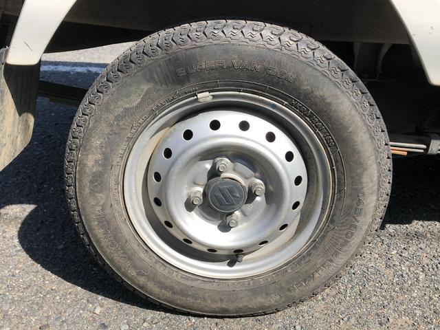 キャリイトラック KCパワステ 4WD 5速ミッション ワンオーナー/禁煙車 タイミングチェーン 三方開 純正AM/FMラジオ ヘッドライトレベライザー(19枚目)