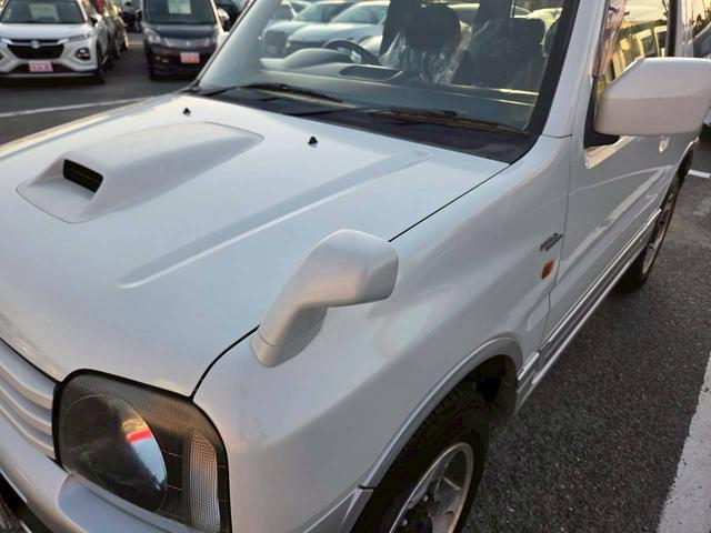 ジムニー ワイルドウインド 後期型 5速ミッション パートタイム4WD タイミングチェーン シートヒーター 革巻きハンドル 背面タイヤ/ハードカバー 電動格納ドアミラー エアコン パワステ パワーウインドウ(6枚目)