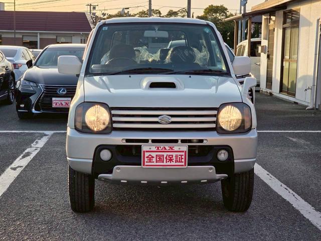 ジムニー ワイルドウインド 後期型 5速ミッション パートタイム4WD タイミングチェーン シートヒーター 革巻きハンドル 背面タイヤ/ハードカバー 電動格納ドアミラー エアコン パワステ パワーウインドウ(8枚目)