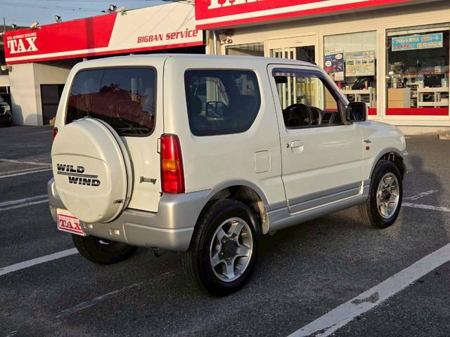 ジムニー ワイルドウインド 後期型 5速ミッション パートタイム4WD タイミングチェーン シートヒーター 革巻きハンドル 背面タイヤ/ハードカバー 電動格納ドアミラー エアコン パワステ パワーウインドウ(18枚目)