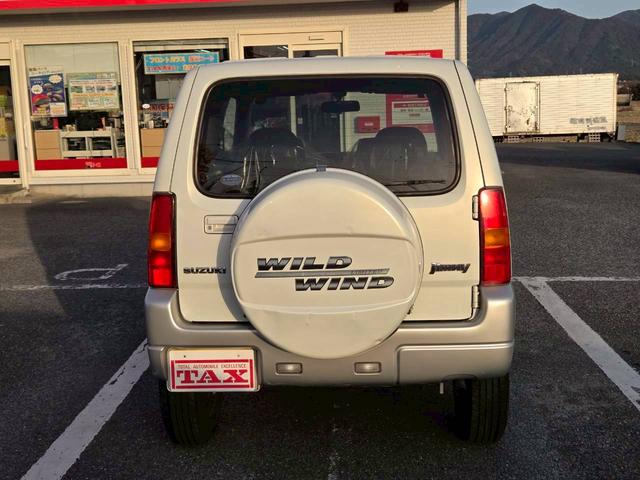 ジムニー ワイルドウインド 後期型 5速ミッション パートタイム4WD タイミングチェーン シートヒーター 革巻きハンドル 背面タイヤ/ハードカバー 電動格納ドアミラー エアコン パワステ パワーウインドウ(21枚目)