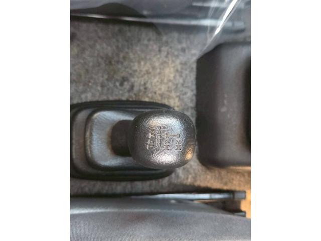 ジムニー ワイルドウインド 後期型 5速ミッション パートタイム4WD タイミングチェーン シートヒーター 革巻きハンドル 背面タイヤ/ハードカバー 電動格納ドアミラー エアコン パワステ パワーウインドウ(22枚目)