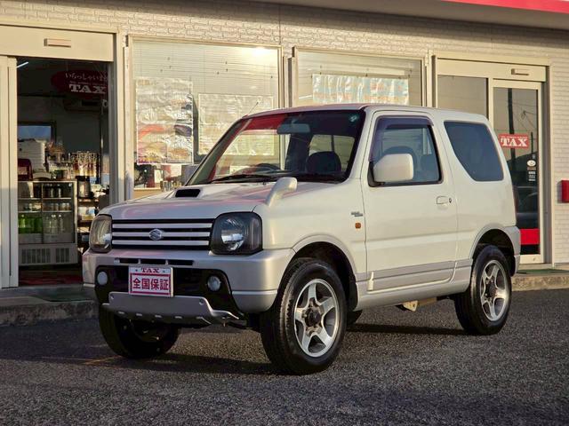 ジムニー ワイルドウインド 後期型 5速ミッション パートタイム4WD タイミングチェーン シートヒーター 革巻きハンドル 背面タイヤ/ハードカバー 電動格納ドアミラー エアコン パワステ パワーウインドウ(27枚目)