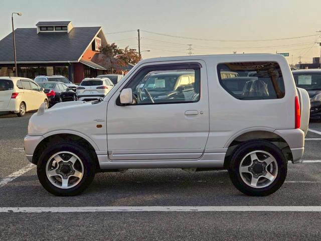 ジムニー ワイルドウインド 後期型 5速ミッション パートタイム4WD タイミングチェーン シートヒーター 革巻きハンドル 背面タイヤ/ハードカバー 電動格納ドアミラー エアコン パワステ パワーウインドウ(36枚目)