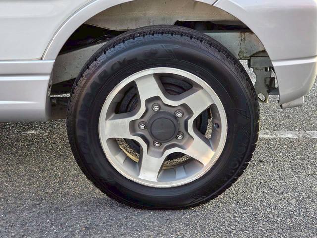 ジムニー ワイルドウインド 後期型 5速ミッション パートタイム4WD タイミングチェーン シートヒーター 革巻きハンドル 背面タイヤ/ハードカバー 電動格納ドアミラー エアコン パワステ パワーウインドウ(43枚目)
