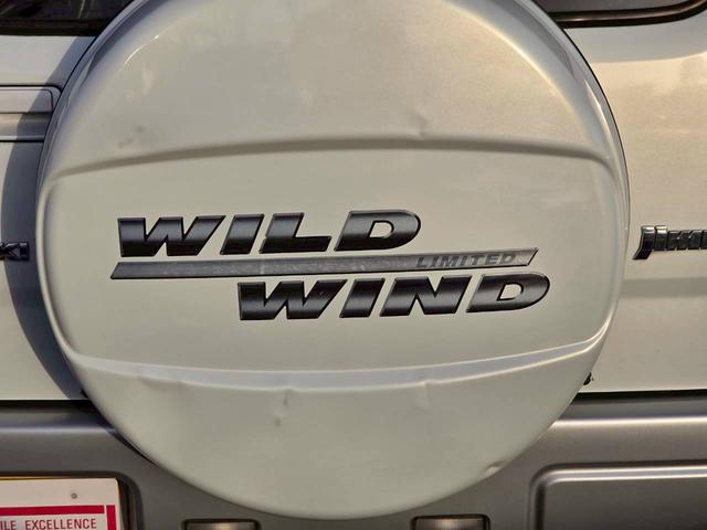 ジムニー ワイルドウインド 後期型 5速ミッション パートタイム4WD タイミングチェーン シートヒーター 革巻きハンドル 背面タイヤ/ハードカバー 電動格納ドアミラー エアコン パワステ パワーウインドウ(50枚目)