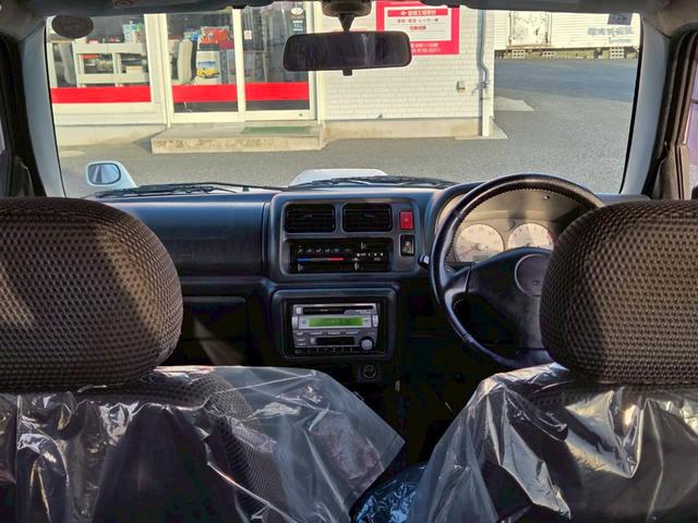 ジムニー ワイルドウインド 後期型 5速ミッション パートタイム4WD タイミングチェーン シートヒーター 革巻きハンドル 背面タイヤ/ハードカバー 電動格納ドアミラー エアコン パワステ パワーウインドウ(58枚目)