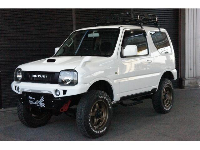 ジムニー ＸＧ　リフトＵＰ・社外前後バンパー・社外ホイール・リアナンバー移設・社外マフラー・ルーフキャリア・リアラダー・ステップ（7枚目）