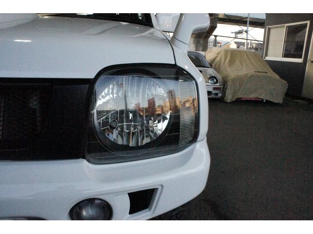 ジムニー ＸＧ　リフトＵＰ・社外前後バンパー・社外ホイール・リアナンバー移設・社外マフラー・ルーフキャリア・リアラダー・ステップ（23枚目）