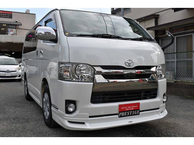 ハイエースバン スーパーＧＬ　ダークプライムＩＩ　５型・ワンオーナー禁煙車・純正ＬＥＤヘッドライト・スマートキー・ナビ・ＴＶ・純正バックモニター内蔵防眩インナーミラー・フルエアロ・ＡＣ１００Ｖ付き（2枚目）