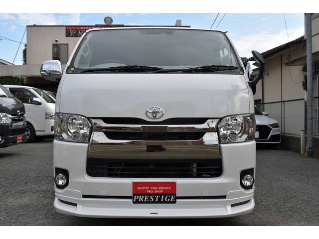 ハイエースバン スーパーＧＬ　ダークプライムＩＩ　５型・ワンオーナー禁煙車・純正ＬＥＤヘッドライト・スマートキー・ナビ・ＴＶ・純正バックモニター内蔵防眩インナーミラー・フルエアロ・ＡＣ１００Ｖ付き（3枚目）