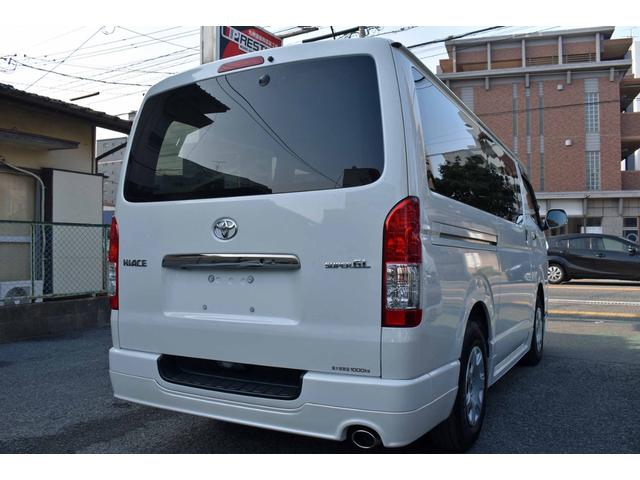 ハイエースバン スーパーＧＬ　ダークプライムＩＩ　５型・ワンオーナー禁煙車・純正ＬＥＤヘッドライト・スマートキー・ナビ・ＴＶ・純正バックモニター内蔵防眩インナーミラー・フルエアロ・ＡＣ１００Ｖ付き（7枚目）