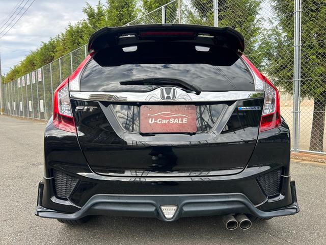 フィットハイブリッド Ｓパッケージ　スマートキー　　あんしんパッケージ　　無限グリル　　アルミ　　バックカメラ　　ＬＥＤヘッドライト　　リアスポイラー　　１年保証（12枚目）