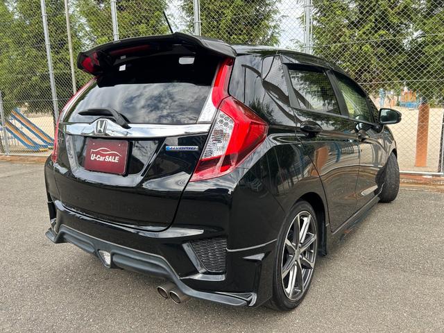 フィットハイブリッド Ｓパッケージ　スマートキー　　あんしんパッケージ　　無限グリル　　アルミ　　バックカメラ　　ＬＥＤヘッドライト　　リアスポイラー　　１年保証（18枚目）