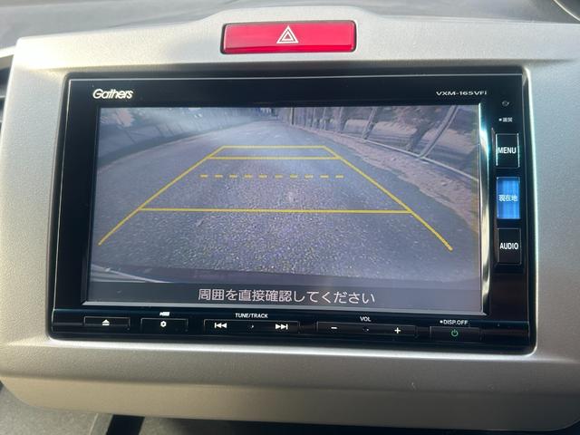 フリードハイブリッド ハイブリッド　プレミアムエディション　６人乗り　両側パワースライドドア　　ＥＴＣ　　スマートキー　　ＨＩＤライト　　ナビ・ＴＶ（ワンセグ）　　バックカメラ　　１年保証（15枚目）