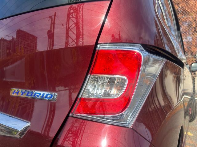 フリードハイブリッド ハイブリッド　プレミアムエディション　６人乗り　両側パワースライドドア　　ＥＴＣ　　スマートキー　　ＨＩＤライト　　ナビ・ＴＶ（ワンセグ）　　バックカメラ　　１年保証（24枚目）