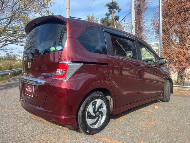 フリードハイブリッド ハイブリッド　プレミアムエディション　６人乗り　両側パワースライドドア　　ＥＴＣ　　スマートキー　　ＨＩＤライト　　ナビ・ＴＶ（ワンセグ）　　バックカメラ　　１年保証（49枚目）