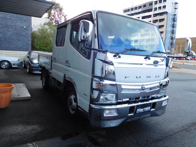 キャンター Ｗキャブロング全低床　Ｗキャブ　カスタムメッキ　メッキ新品バンパーフロントメッキフェンター　後期　新品笠木　６速デュオニック　キーレス　デッキ鉄板張り　オーバーヘッドシェルフ　リヤヒーター　左電動格納ミラー　荷台作業灯（3枚目）