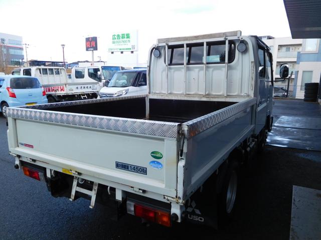 キャンター Ｗキャブロング全低床　Ｗキャブ　カスタムメッキ　メッキ新品バンパーフロントメッキフェンター　後期　新品笠木　６速デュオニック　キーレス　デッキ鉄板張り　オーバーヘッドシェルフ　リヤヒーター　左電動格納ミラー　荷台作業灯（5枚目）