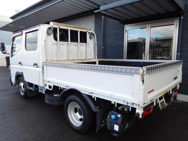 キャンター Ｗキャブロング全低床　Ｗキャブ　カスタムメッキ　メッキ新品バンパーフロントメッキフェンター　後期　新品笠木　６速デュオニック　キーレス　デッキ鉄板張り　オーバーヘッドシェルフ　リヤヒーター　左電動格納ミラー　荷台作業灯（9枚目）