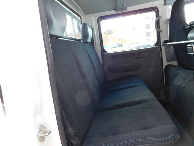 キャンター Ｗキャブロング全低床　Ｗキャブ　カスタムメッキ　メッキ新品バンパーフロントメッキフェンター　後期　新品笠木　６速デュオニック　キーレス　デッキ鉄板張り　オーバーヘッドシェルフ　リヤヒーター　左電動格納ミラー　荷台作業灯（22枚目）