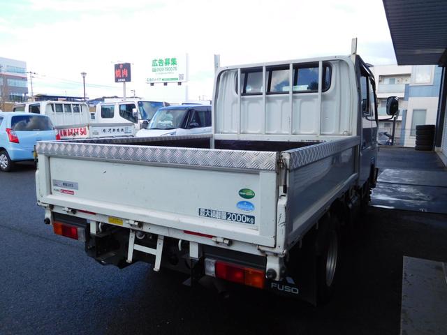 キャンター Ｗキャブ全低床　Ｗキャブ　カスタムメッキ　メッキ新品バンパー　フロントメッキフェンター　後期　新品笠木　６速デュオニック　キーレス　積載量２０００Ｋｇ　オーバーヘッドシェルフ　リヤヒーター　左電動格納ミラー　ＥＴＣ（5枚目）