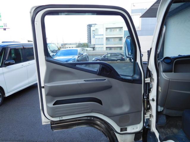 キャンター Ｗキャブ全低床　Ｗキャブ　カスタムメッキ　メッキ新品バンパー　フロントメッキフェンター　後期　新品笠木　６速デュオニック　キーレス　積載量２０００Ｋｇ　オーバーヘッドシェルフ　リヤヒーター　左電動格納ミラー　ＥＴＣ（35枚目）