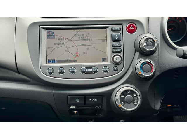 フィット Ｇスマートセレクション　ＥＴＣ　バックカメラ　ナビ　スマートキー　ＣＶＴ　盗難防止システム　衝突安全ボディ　ＡＢＳ　エアコン　パワーステアリング（12枚目）