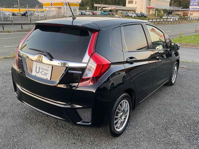 フィットハイブリッド Ｌパッケージ　ＥＴＣ　バックカメラ　ＴＶ　オートクルーズコントロール　ＬＥＤヘッドランプ　スマートキー　ＡＴ　盗難防止システム　衝突安全ボディ　アルミホイール　ＣＤ　ＵＳＢ（12枚目）