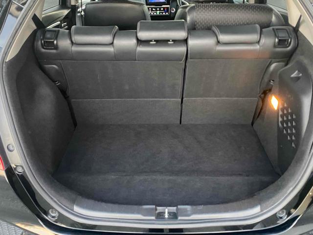 フィットハイブリッド Ｌパッケージ　ＥＴＣ　バックカメラ　ＴＶ　オートクルーズコントロール　ＬＥＤヘッドランプ　スマートキー　ＡＴ　盗難防止システム　衝突安全ボディ　アルミホイール　ＣＤ　ＵＳＢ（16枚目）