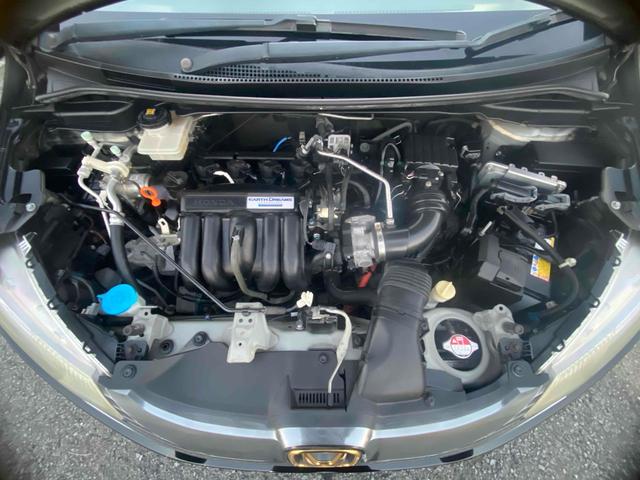 フィットハイブリッド Ｌパッケージ　ＥＴＣ　バックカメラ　ＴＶ　オートクルーズコントロール　ＬＥＤヘッドランプ　スマートキー　ＡＴ　盗難防止システム　衝突安全ボディ　アルミホイール　ＣＤ　ＵＳＢ（18枚目）