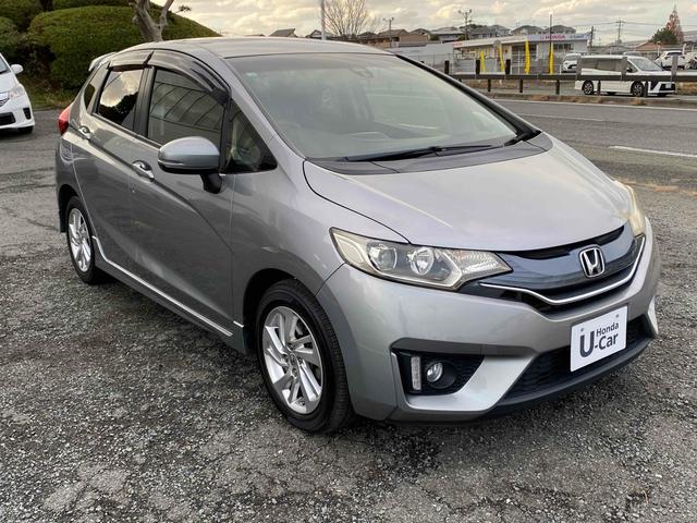 フィット 13G・Sパッケージ バックカメラ 衝突被害軽減システム アルミホイール オートライト LEDヘッドランプ スマートキー チップアップシート CVT 盗難防止システム 衝突安全ボディ ABS ESC CD DVD再生(10枚目)