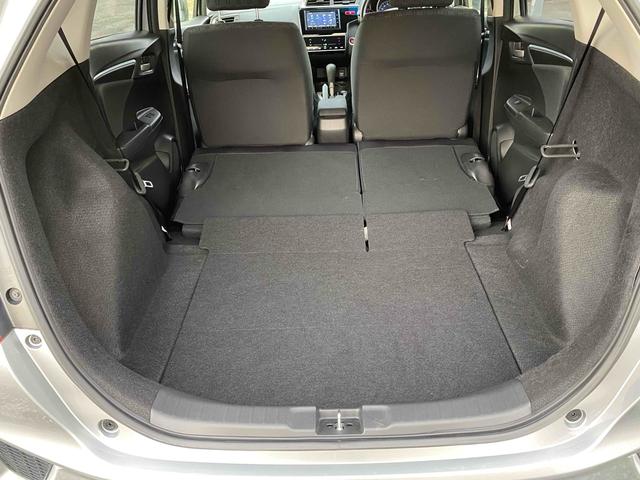 フィット 13G・Sパッケージ バックカメラ 衝突被害軽減システム アルミホイール オートライト LEDヘッドランプ スマートキー チップアップシート CVT 盗難防止システム 衝突安全ボディ ABS ESC CD DVD再生(15枚目)