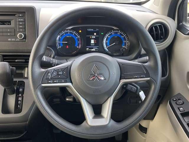 ｅＫワゴン Ｍ　三菱認定保証　純正ＣＤチューナー　踏み間違い防止アシスト　イモビライザー　パワーウィンドウ　Ｐセンサー　マニュアルエアコン　バックカメラ　キーレスエントリー　前席シートヒーター　ＡＳＣ　エアバック（3枚目）