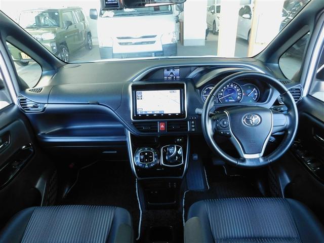 ヴォクシー ハイブリッドＺＳ　煌ＩＩ　３列シ－ト　キーフリー　ＥＴＣ車載器　ドラレコ付き　ウォークスルー　フルセグテレビ　ＬＥＤヘッドライト　デュアルエアコン　スマートキー　定期点検記録簿　ＡＵＸ　アルミ　メモリーナビゲーション　クルコン（4枚目）