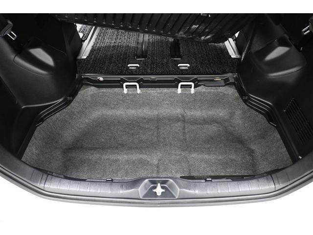 ヴォクシー ZS 煌 地上デジタル 両側パワードア アイドリングストップ車 パワーウィンド 横滑防止 DVD可 盗難防止装置 スマートエントリー Bカメラ LEDヘッドライト メモリーナビ 3列シート ダブルエアコン AW(10枚目)