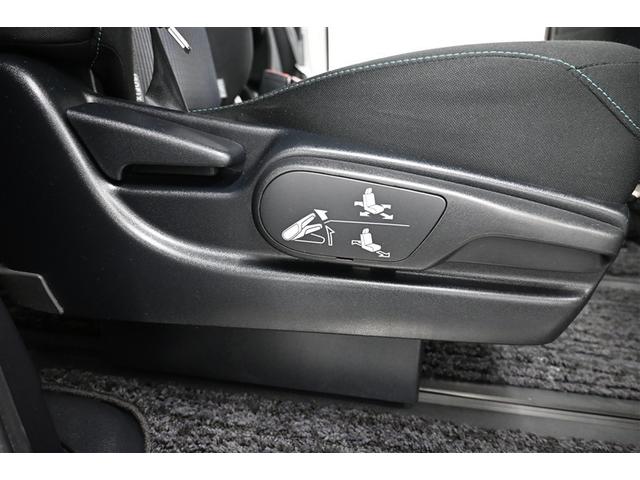 ヴォクシー ZS 煌 地上デジタル 両側パワードア アイドリングストップ車 パワーウィンド 横滑防止 DVD可 盗難防止装置 スマートエントリー Bカメラ LEDヘッドライト メモリーナビ 3列シート ダブルエアコン AW(13枚目)