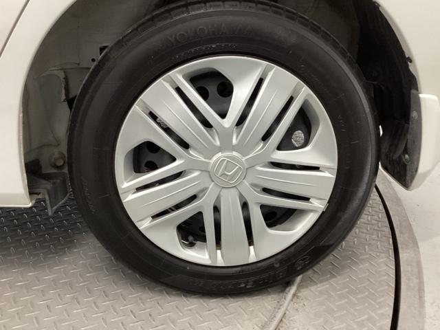 フィット １３Ｇ・Ｌホンダセンシング　純正メモリーナビ　ドラレコ　リアカメラ　地デジフルセグＴＶ　ＥＴＣ車載器　ＤＶＤ再生可　ナビ＆ＴＶ　サイドカーテンエアバック　Ｄレコ　ＵＳＢ　エアバック　パワーウインドウ　記録簿　キーフリーシステム（21枚目）