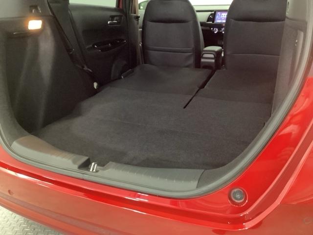 フィット ｅ：ＨＥＶホーム２０周年特別仕様車カーサ　ＨｏｎｄａＣＯＮＮＥＣＴ対応純正メモリーナビ　ＤＶＤ　シートヒーター　横滑り防止装置　ＥＴＣ　フルセグ　ＬＥＤヘッドライト　スマキー　オートクルーズコントロール　サイドエアバック　盗難防止システム（34枚目）