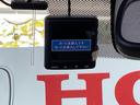 Lホンダセンシング メモリーナビ ドラレコ リアカメラ ETC装備 Bモニタ 誤発進抑制 シートヒータ オートライト DVD フルセグ 横滑り防止機能 セキュリティアラーム キーフリー ナビTV スマートキー 記録簿(47枚目)