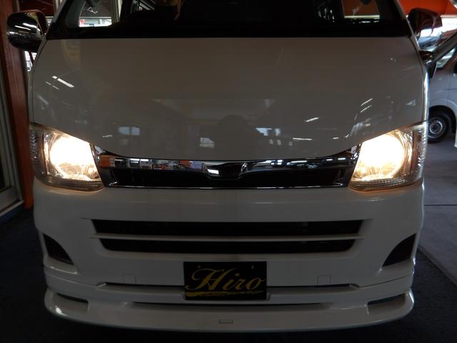 ハイエースバン 純正SDナビ&TV・バックカメラ・ディーゼルターボ・Bluetooth・社外エアロボンネット&フロントスポイラー&アルミ・ホワイトレタータイヤ・ウッド調パネル・リアベットkit・黒レザーシートカバー(77枚目)