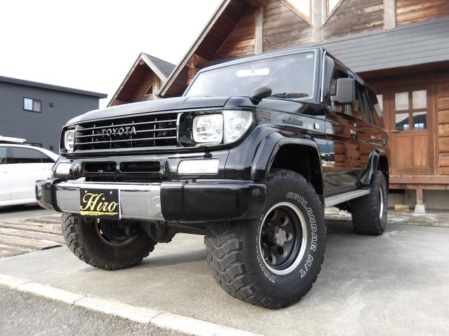 ランドクルーザープラド SXワイドリミテッド メモリアルパッケージ 1ナンバー登録・5人乗り・リフトアップ・社外15インチアルミホイール・ヨコハマM/Tタイヤ・黒レザーシートカバー・ETC付き(13枚目)